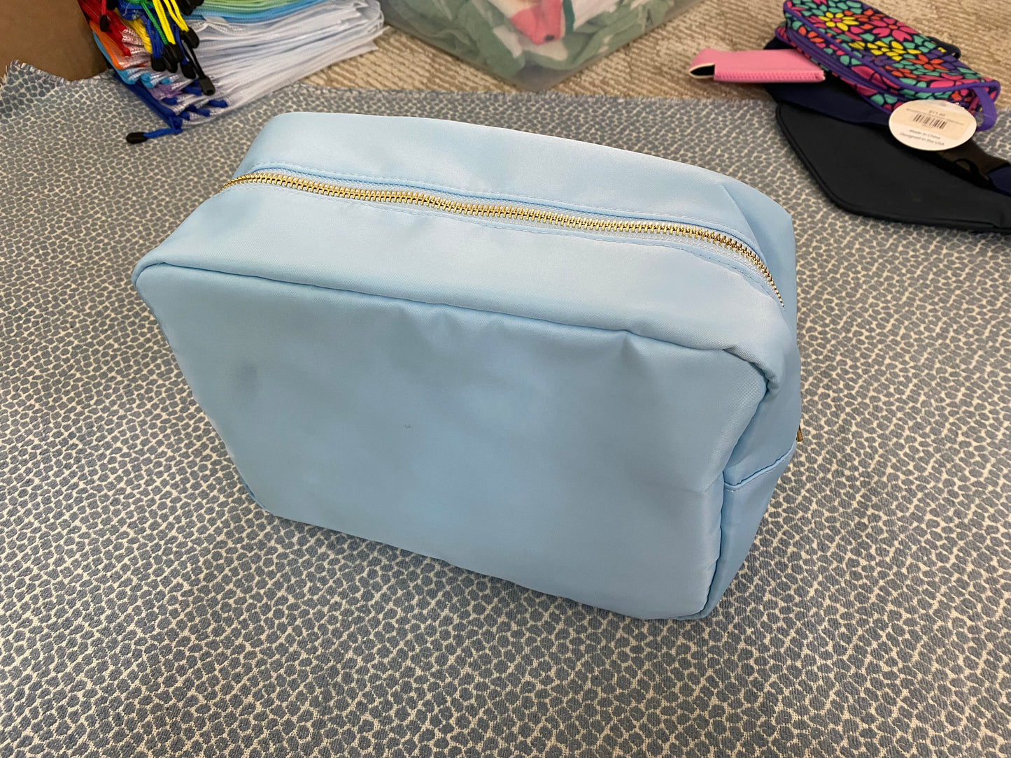 Soft cosmetic bag with custom embroidery